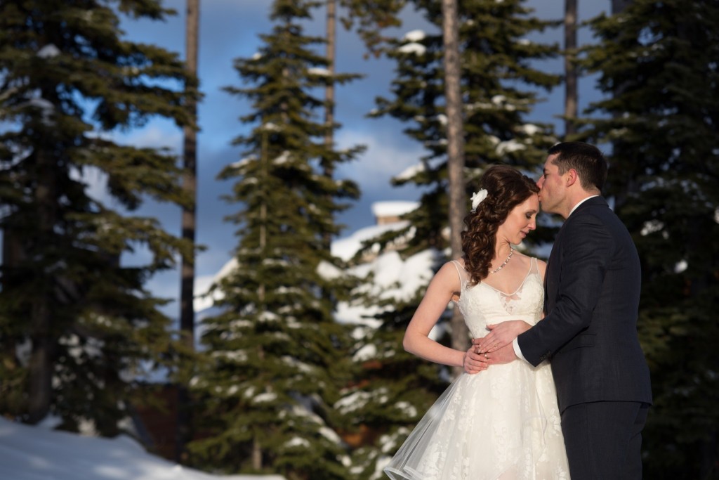 Stellavate Creative | Victoria BC wedding Photographer | Bride and groom kiss in the forest at big white