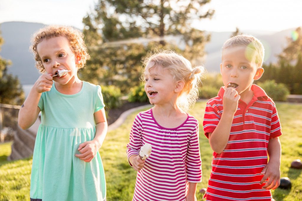 Victoria BC Family Photographer | children eating ice cream cones at sunset