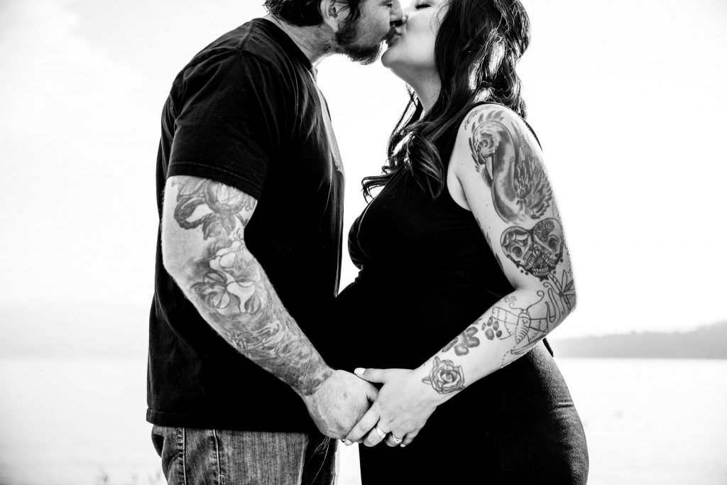 Victoria BC Family Photographer | pregnant couple poses on the beach
