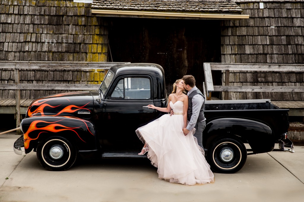 Stellavate Photography | Victoria BC wedding Photographer | Bride and groom pose on a vintage truck