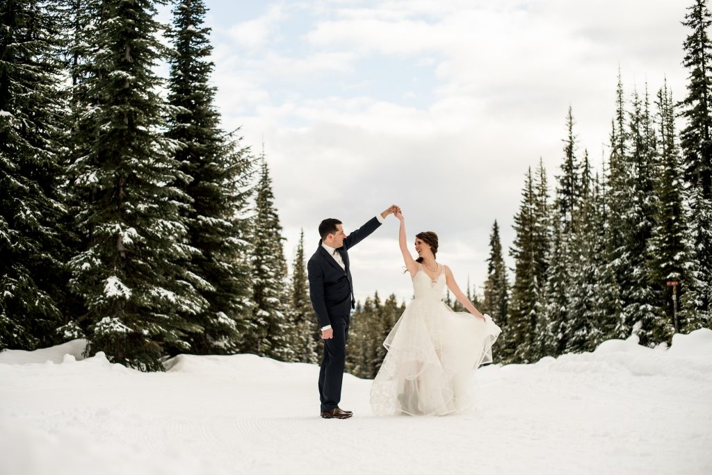 Stellavate Photography | Victoria BC wedding Photographer | Couple dances in the snow at big white wedding