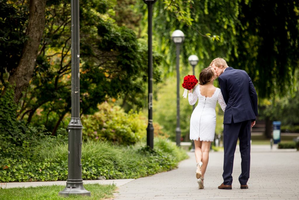 Stellavate Photography | Victoria BC wedding Photographer | Couple walk and kiss at ubc elopement