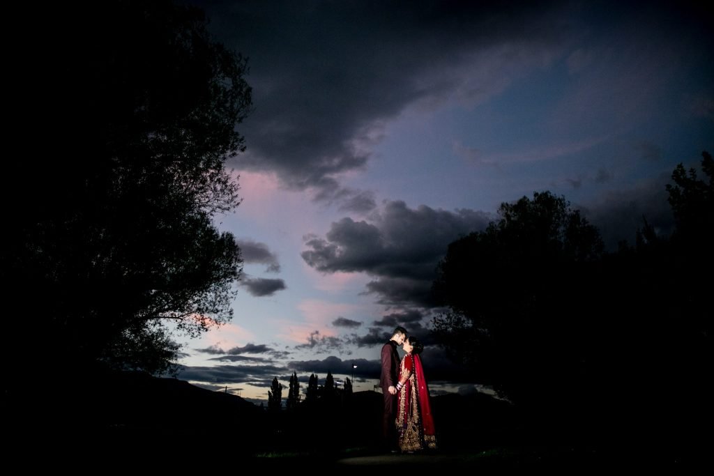 Stellavate Photography | Victoria BC wedding Photographer | Indian wedding couple poses at night with flash