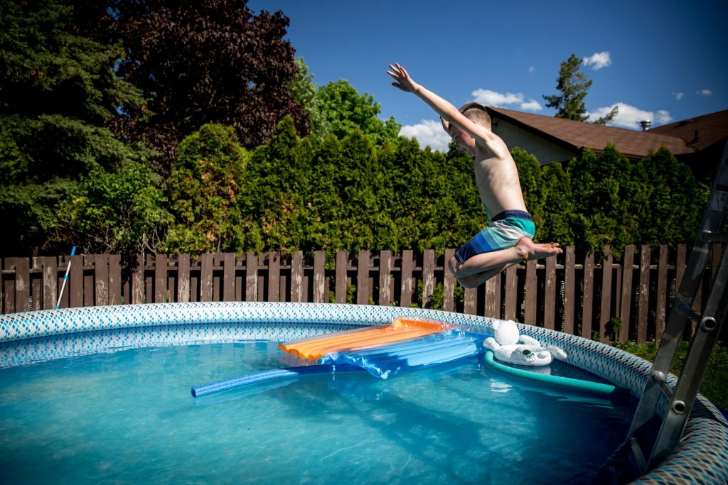 Victoria BC Family Photographer | children playing in pool
