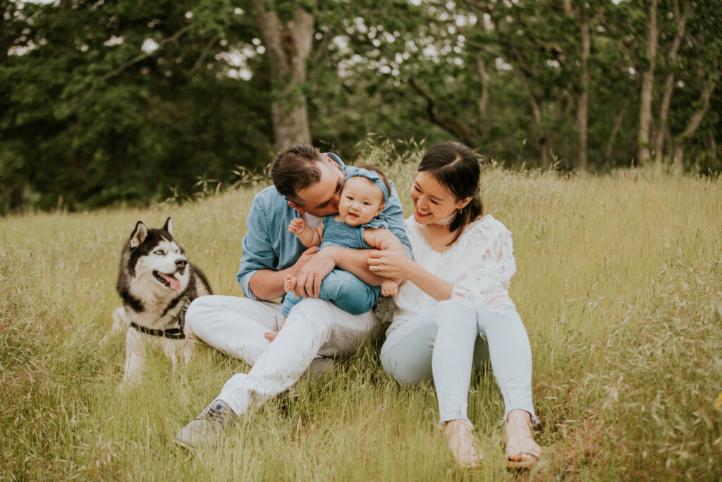 Victoria BC Family Photographer | family in a field with a baby and dog